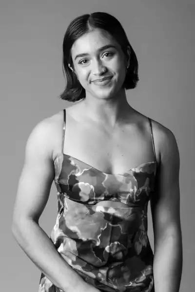 Black and white headshot of Asha Colless