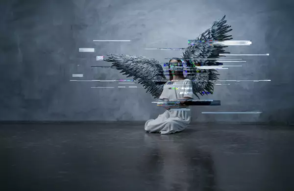 An angel cowers in a corner with glitchy effect