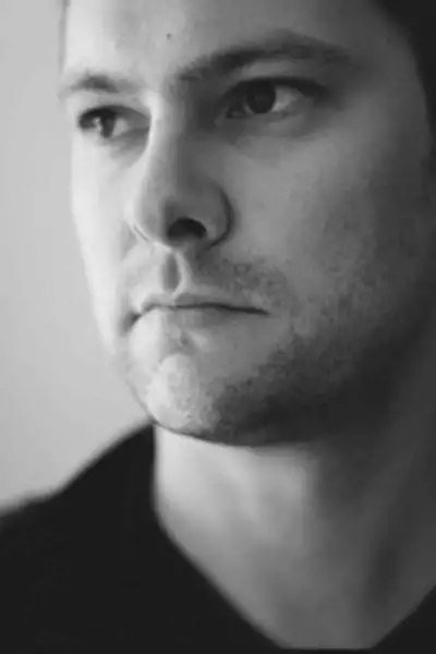 Black and white headshot of Jethro Woodward