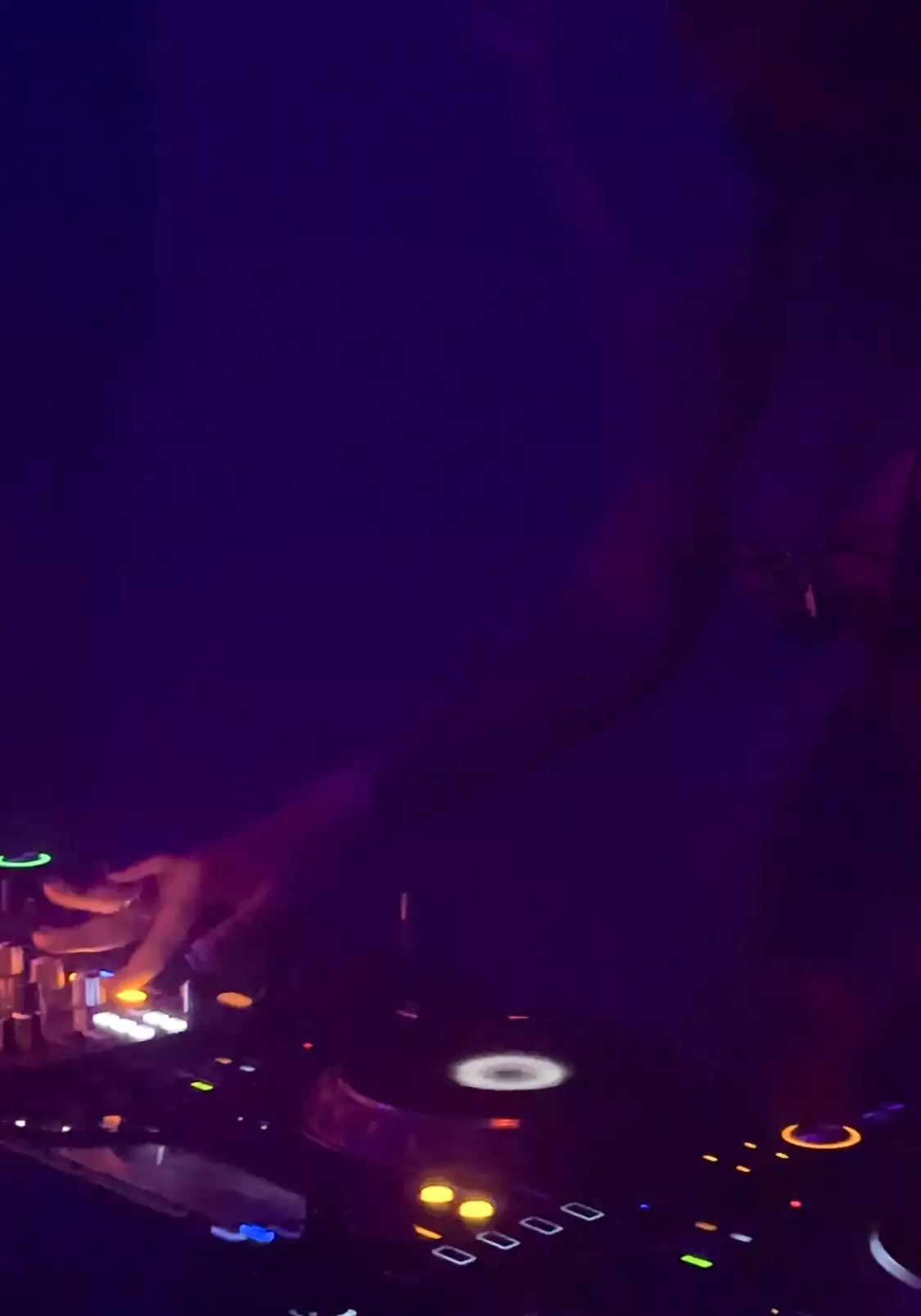 A DJ behind decks