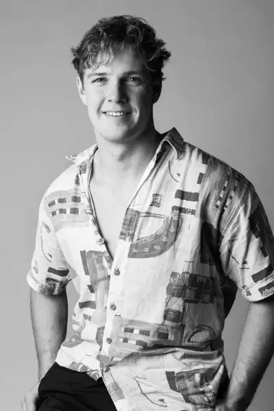 Black and white headshot of Tristan St John